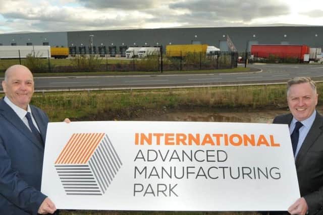 Council leaders Paul Watson, left, and Iain Malcolm at the site of the International Advanced Manufacturing Park.