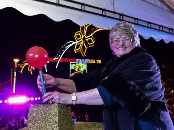 Mayor of Sunderland Coun Doris MacKnight switches on the Feast lights.