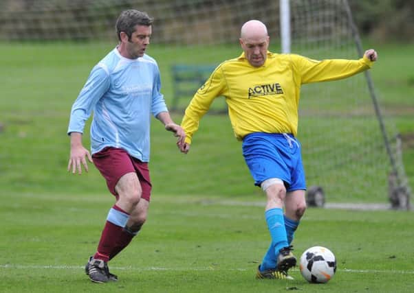 Pennywell Comrades (yellow) take on Wearmouth CW Old Boys in the Over-40s League last week.