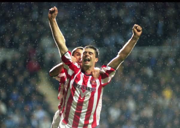 Niall Quinn celebrates with Kevin Phillips