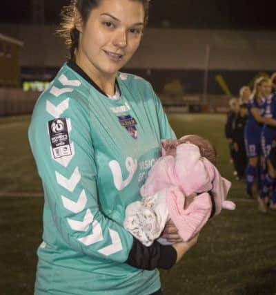 Helen Alderson with team-mate Sarah Robson's baby Harper ahead of the Durham WFC v Sunderland AFC Ladies in the Continental Tyres Cup at New Ferens Park. Pic courtesy of George Ledger Sports Photography.