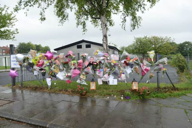Floral tributes to Julie Parkin at West Boldon Primary School, where she worked as a teacher.