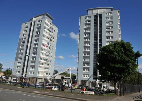 Gentoo remove cladding from flats at Church Street North, Sunderland.