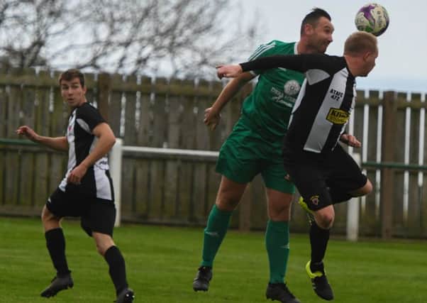 Easington Colliery (green) take on Alnwick Town in the Northern League last Saturday. Picture by Kevin Brady