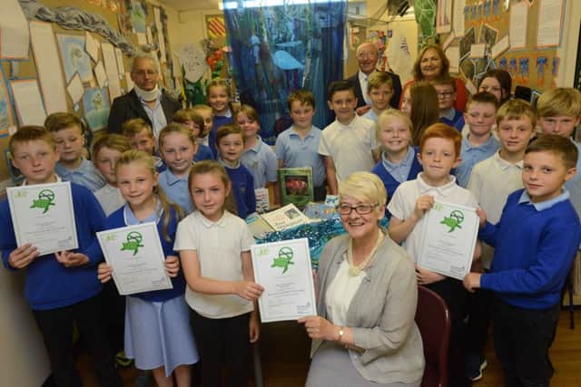 Hetton Primary School Pollution from Me to Sea project winners. Project organiser Hetton's Local History Society Pat Robson with class winners