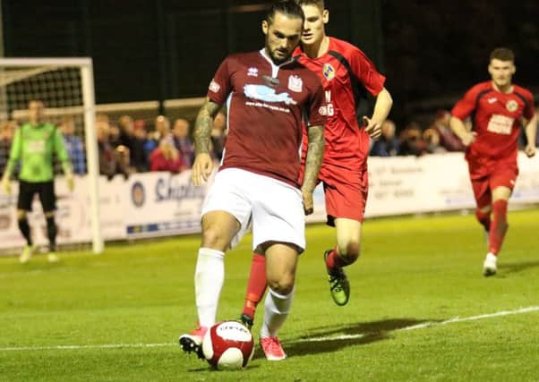 South Shields' Anthony Callaghan collects the ball under pressure in last night's win over Jarrow Roofing. Picture by Peter Talbot.