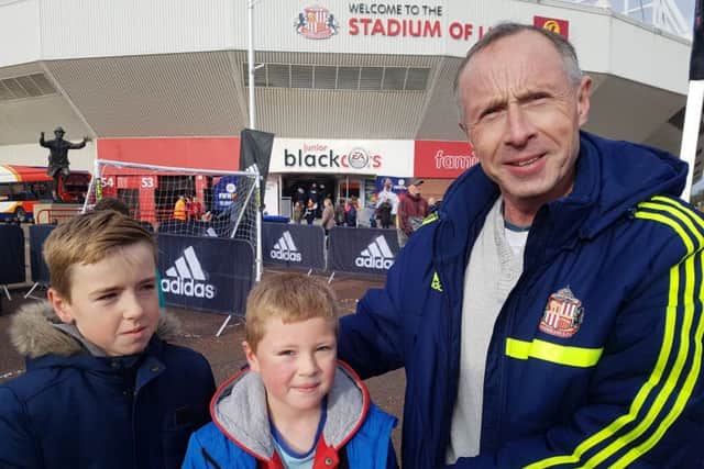 Sunderland fan Roy Hammonds with grandchildren Aaron Strasenburgh, 11, and Zach Lavery, six.