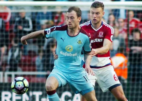 Middlesbrough's Ben Gibson (right) gets to grips with Burnley's Ashley Barnes back in April. Picture by Tom Collins.