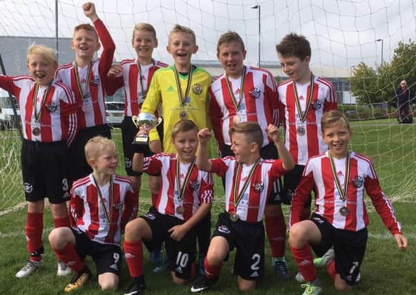 Sunderland Primary Schools Boys celebrate winning the Peter Dunn Trophy
