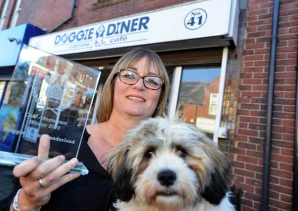 Winner's of the Kennel Club award, Doggie Diner 
Owner Adrienne Dickson with Woody