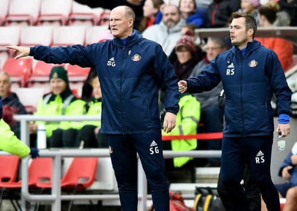 Sunderland boss Simon Grayson and coach Robbie Stockdale issue instructions against Bristol City on Saturday.