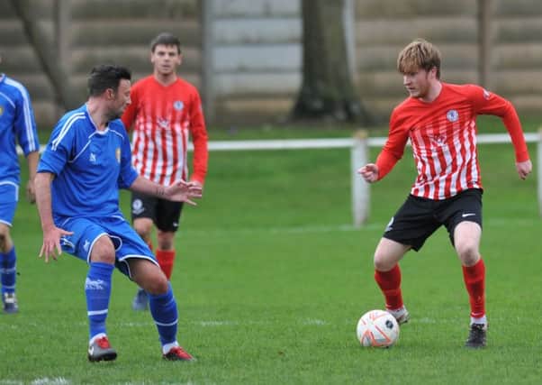 Silksworth CW (red) take on Stokesley in last weekend's 5-0 victory. Picture by Tim Richardson