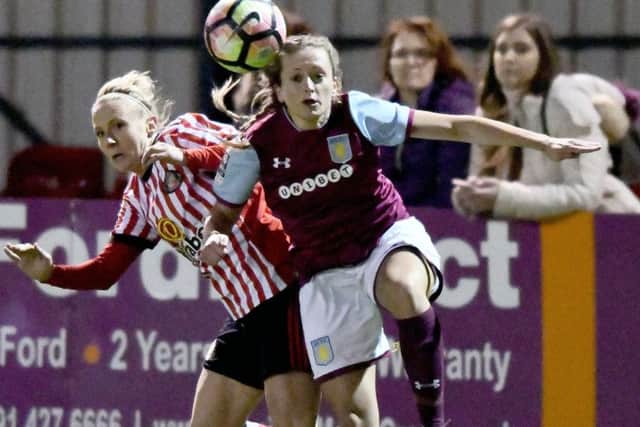 Sunderland Ladies' Kylla Sjoman loses out in a challenge against Aston Villa.