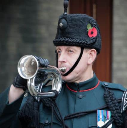 Rifleman Stephen Elliott playing the 'Rifles Assembly' at the launch of 8 Rifles in Durham.