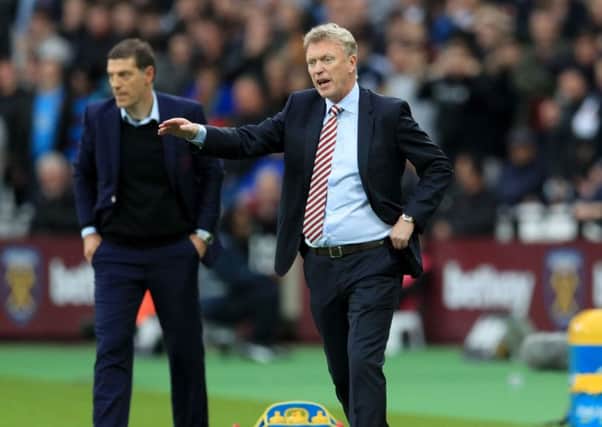 Former Sunderland manager David Moyes (right) and with former West Ham United manager Slaven Bilic.
