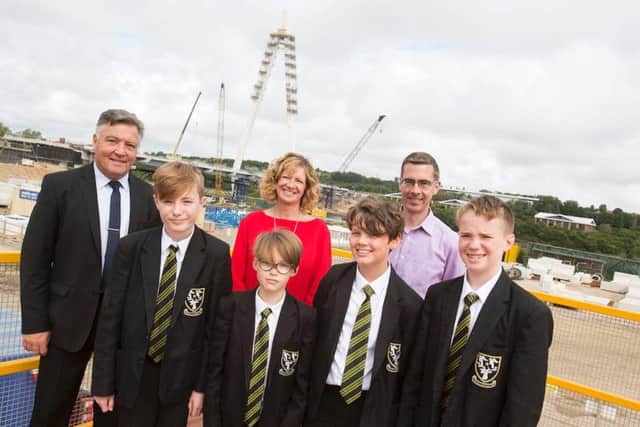 Students from St Aidans Academy are pictured with Cllr Mel Speding, Sunderland City Councils Cabinet Secretary, (back left), with New Wear Crossing Communications Officer Karen Westcott, and Stephen McCaffrey, Project Director of FVB Joint Venture, which was formed by Farrans Construction and Victor Buyck Steel Construction to deliver the project on behalf of the Council.