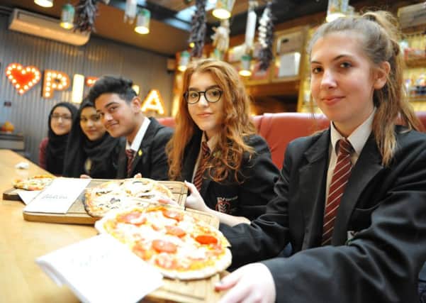 Pupils from Thornhill School tuck into their pizzas at the Roker Hotel's Italian Farmhouse.