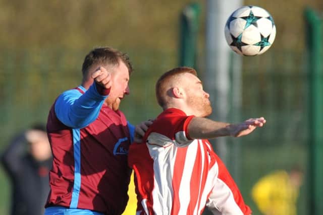 Lakeside SSC (red/white) battle it out with Ryhope last weekend. Picture by Tim Richardson