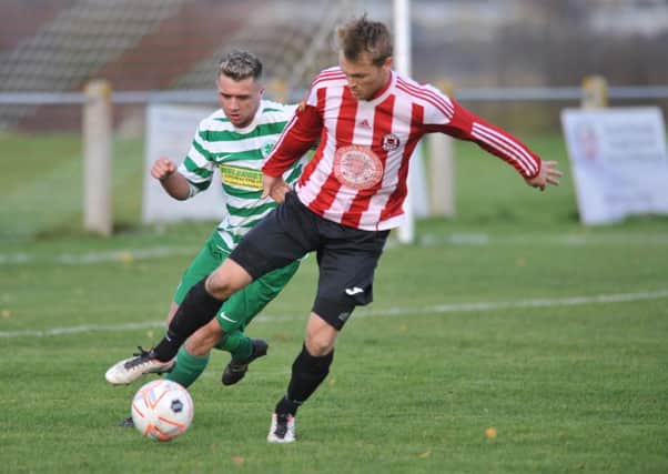 Sunderland West End (red/white) take on Cleator Moor Celtic last weekend. Picture by Tim Richardson.