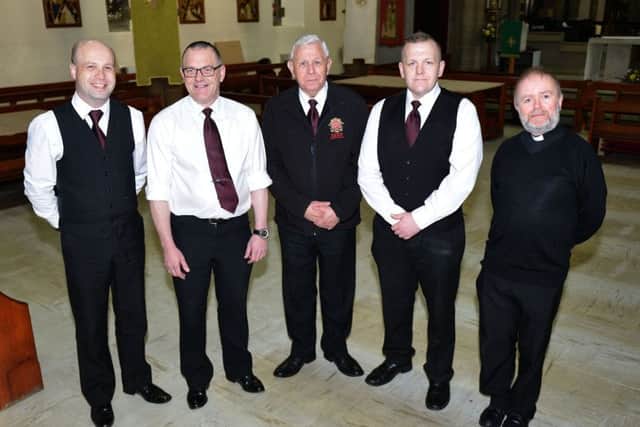 Father Andrew Collins Jones (right) with John Hogg Funeral Directors staff (left to right) Stephen Martin, Kenneth Read, Brian Stephenson and Grant Wilson inside of St. Ignatius Church. Picture by FRANK REID