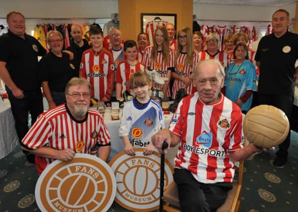 Residents and visitors to St Aldate's Care Home, Grindon, with memorabilia from the Sunderland Football Club Fans Museum.