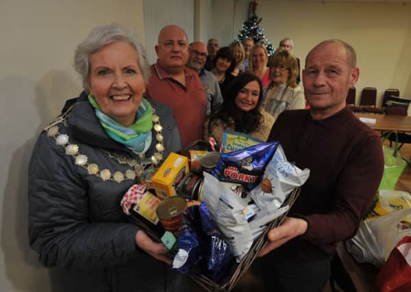 The Mayor of Seaham Coun Sonia Forster and Coun Dave McKenna, are joined by fellow town councillors to launch the towns Christmas Food parcel appeal.