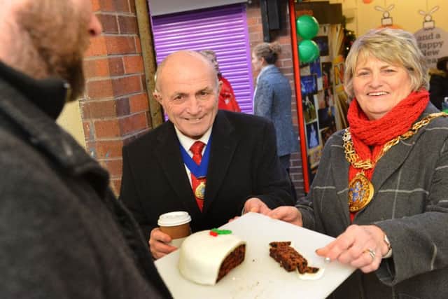 Park Lane Christmas market launch.
Mayor of Sunderland Councillor Doris MacKnight with consort Keith MacKnight sample Sunderland College Christmas cake