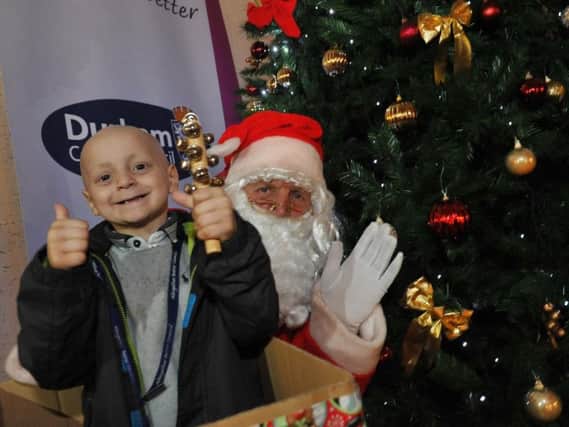 Bradley Lowery and Father Christmas at last year's light switch on at County Hall.