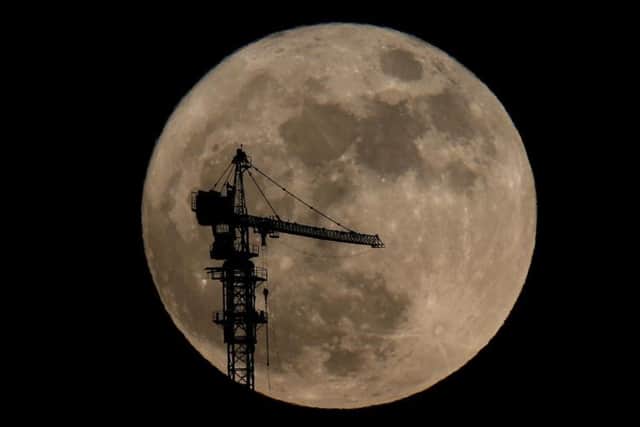 Using landmarks can result in spectacular pictures of the supermoon.