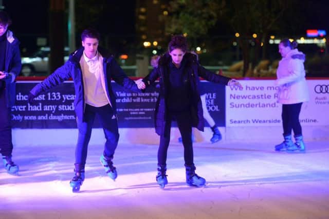Skaters try out the Sunderland city centre ice rink in Keel Square.
