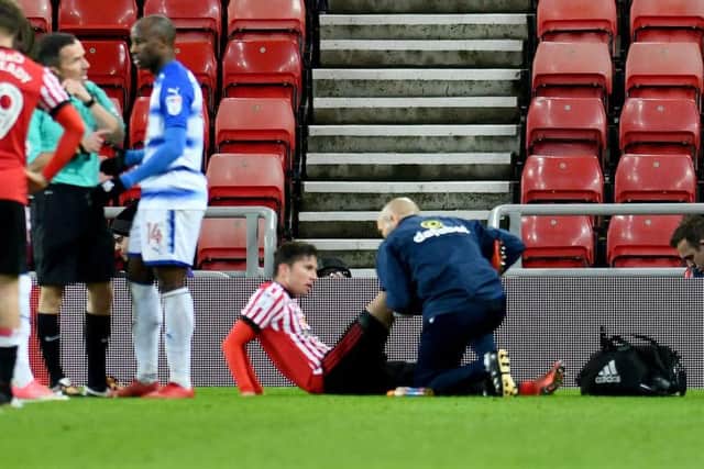 Bryan Oviedo goes down injured against Reading.