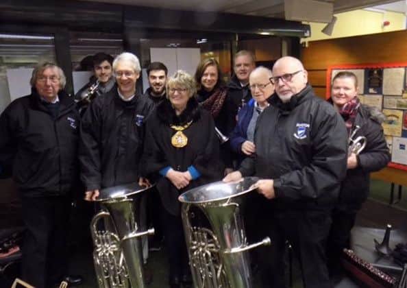 Dunston Brass Band  entertained crowds. Members are pictured with the  Sunderland Mayor Coun Doris McKnight.