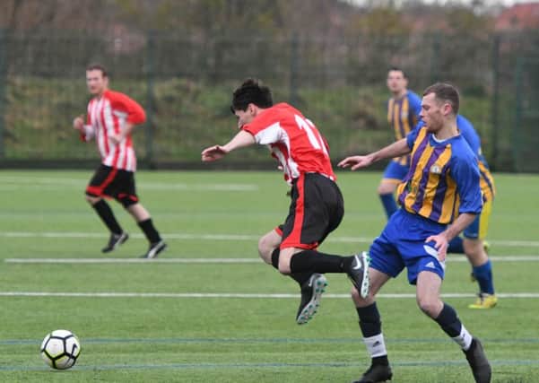 Lakeside (red/white) take on Wear United in the Sunderland Sunday League last weekend. Picture by Kevin Brady