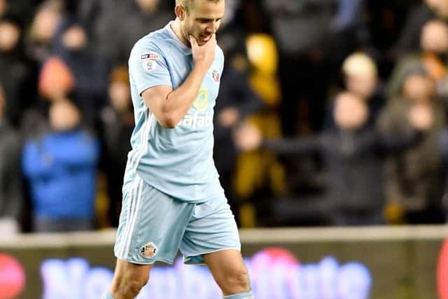 Lee Cattermole walks off after his red card.