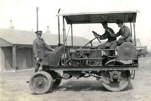 Manning a vehicle on the airfield.