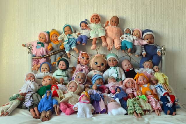 A selection of the dolls which Rose has collected and dressed.