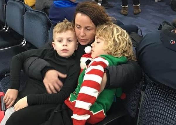 Zach Hunter and Josh Quinn are comforted by Josh's mum Mandy after they were told their Lapland trip was cancelled.