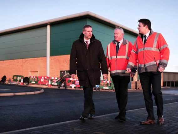Business Durham's Peter Rippingale with Rob Mason and Steve Rowell of Vivarail at the firms new premises on Spectrum Business Park in Seaham.