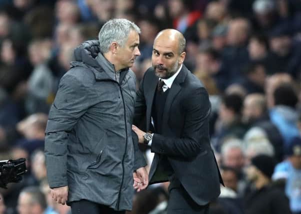 Manchester United manager Jose Mourinho (left) and Manchester City manager Pep Guardiola