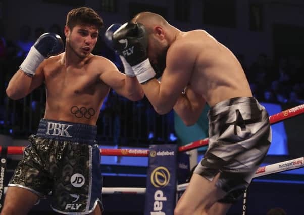 Josh Kelly goes on the attack against Jean Michel Hamilcaro. Picture by Lawerence Lustig/Matchroom Ringside photos and Mark Robinson/Matchroom Backstage photography.