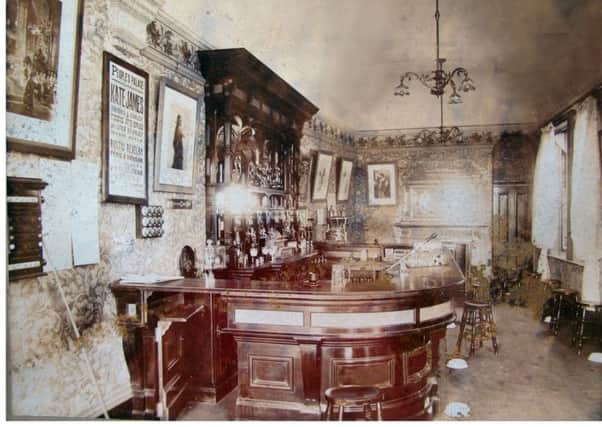 A 1902  interior shot of the George and Dragon pub in High Street West.