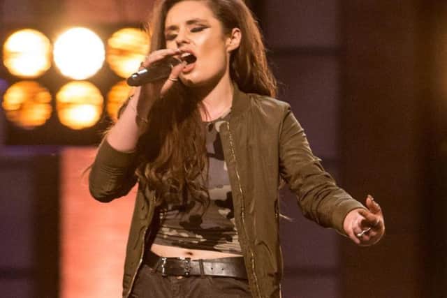 Sam Lavery performing on The X Factor.