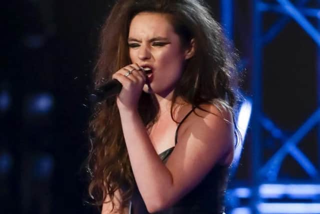 X Factor mogul Simon Cowell advised Sam Lavery to tone down her appearance, saying she was 'over-styled'.