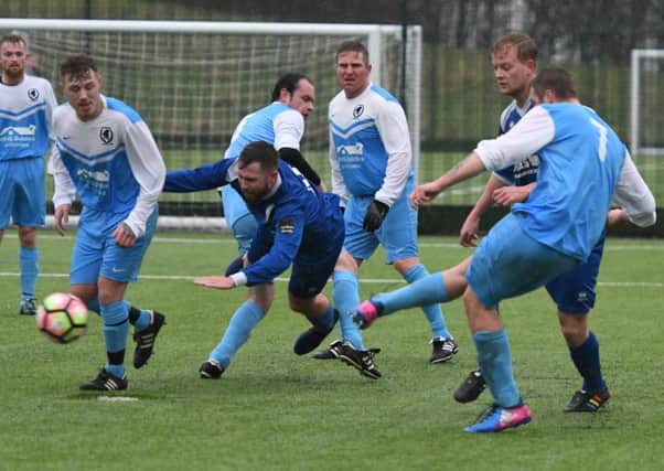 Witherwack (pale blue) take on Herrington CW in the Sunderland Sunday League at Silksworth Sports Complex yesterday. Picture by Kevin Brady