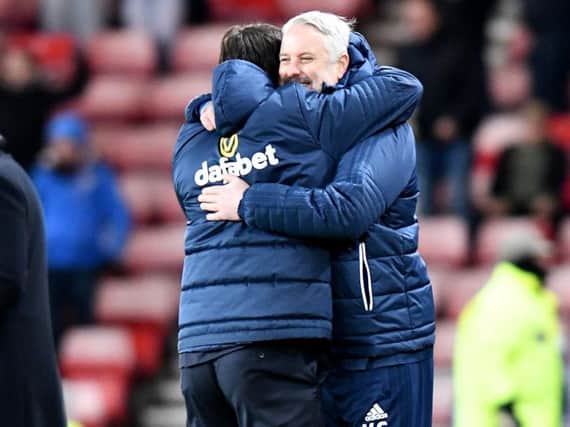 Sunderland manager Chris Coleman and assistant Kit Symons celebrate.