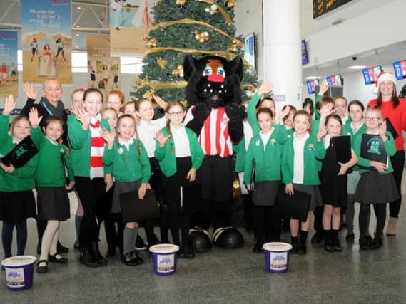 Children fromWest Rainton Primary School at Houghton-le-Spring were invited to sing carols at Newcastle Airport by Sunderlands Foundation of Light.