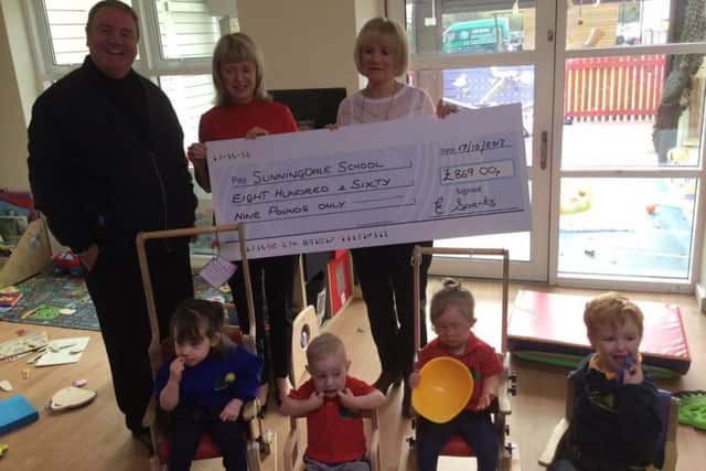 The family of Eleanor Sparks hand over money raised in her memory to Sunningdale School.