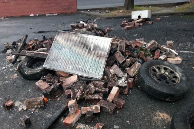 Bricks, tyres and radiators are among what is left after the blaze.