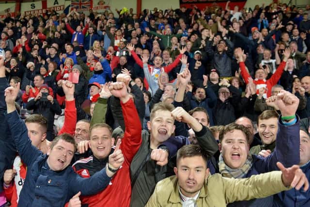 Sunderland supporters celebrate.