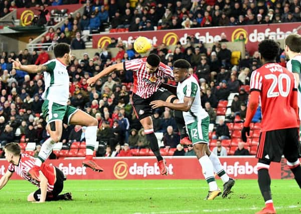 Tyias Browning gets in a header as Sunderland push for a second-half leveller against Barnsley. Picture by Frank Reid